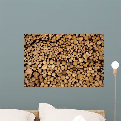 Log Pile Sawmill Gulliver Wall Mural shown on a wall