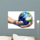 Human Hand Holding Planet Wall Decal
