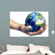 Human Hand Holding Planet Wall Decal