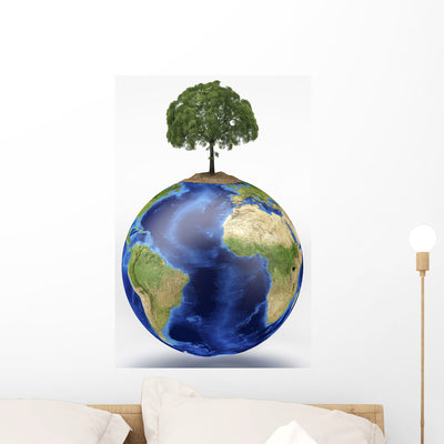 Planet Earth with Tree Wall Decal Design 1 shown on a wall