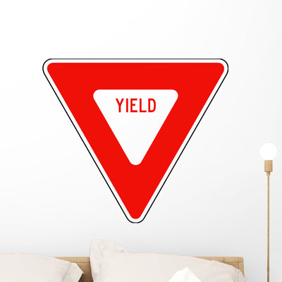 Red Yield Sign Wall Decal shown on a wall