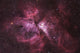 Pink and magenta Carina Nebula cosmic cloud peel and stick wall mural with stars