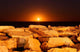 Moon Rising behind Rocks Wall Decal