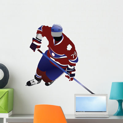 Offensive Play Hockey Silhouette Wall Decal shown on a wall