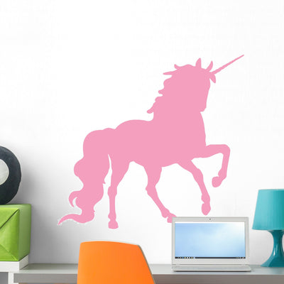 Light Pink Prancing Unicorn Wall Decal shown on a wall