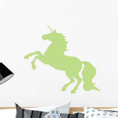 Rearing Unicorn Lime Green Wall Decal shown on a wall