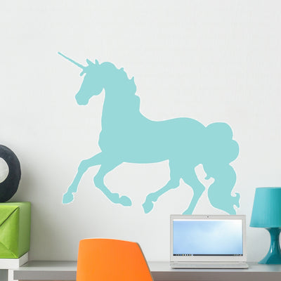 Blue Cantering Unicorn Silhouette Wall Decal shown on a wall