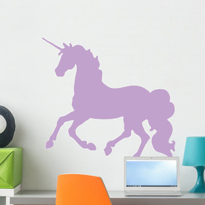 Purple Cantering Unicorn Silhouette Wall Decal shown on a wall