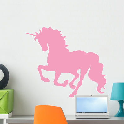 Beautiful Pink Unicorn Silhouette Wall Decal shown on a wall