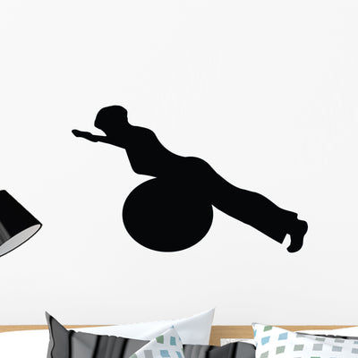 Aerobic Fitness Silhouette Wall Decal shown on a wall