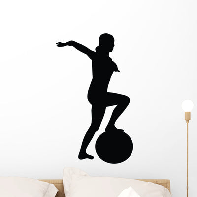 Aerobic Fitness Silhouette Wall Decal shown on a wall