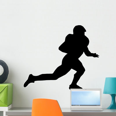 American Football Silhouette Wall Decal shown on a wall