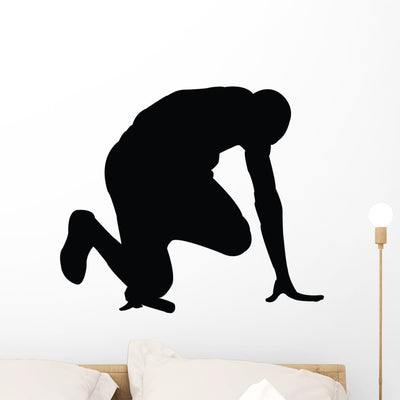 Running Silhouette Wall Decal shown on a wall
