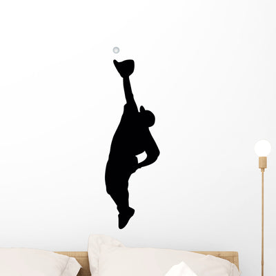 Fielder Catching Baseball Silhouette Wall Decal shown on a wall