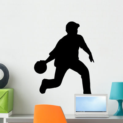 Basketball Silhouette Wall Decal shown on a wall
