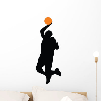 Basketball Player Silhouette Wall Decal shown on a wall