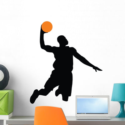 Basketball Player Silhouette Wall Decal shown on a wall