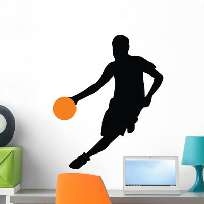 Basketball Player Silhouette Wall Decal shown on a wall