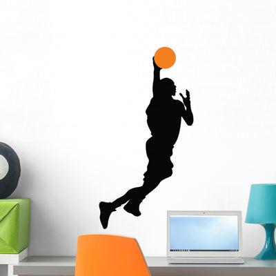 Basketball Player Silhouette Wall Decal shown on a wall