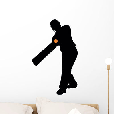 Batter Hitting Cricket Silhouette Wall Decal shown on a wall