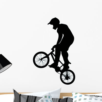 Standing Jump BMX Silhouette Wall Decal shown on a wall