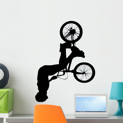 Spinning Jump BMX Silhouette Wall Decal shown on a wall