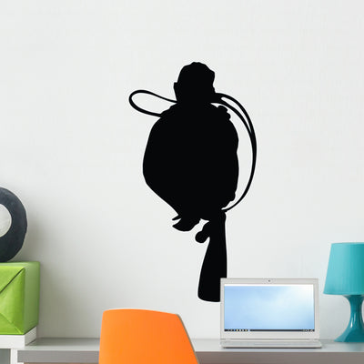 Scuba Diving Silhouette Wall Decal shown on a wall
