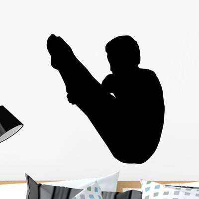 Male Gymnastic Silhouette Wall Decal shown on a wall