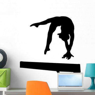 Black Gymnastics Silhouette Wall Decal shown on a wall