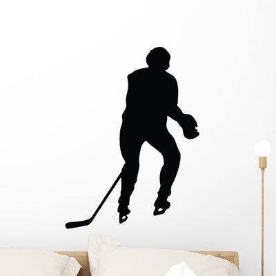 Hockey Silhouette Wall Decal shown on a wall