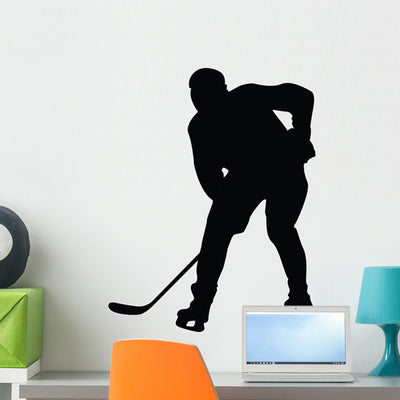 Hockey Silhouette Wall Decal shown on a wall