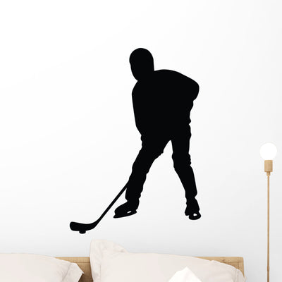 Hockey Silhouette Wall Decal shown on a wall