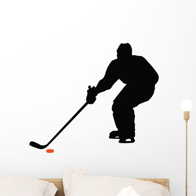 Hockey Silhouette Wall Decal shown on a wall