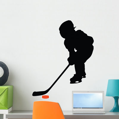 Hockey Silhouette Wall Decal shown on a wall
