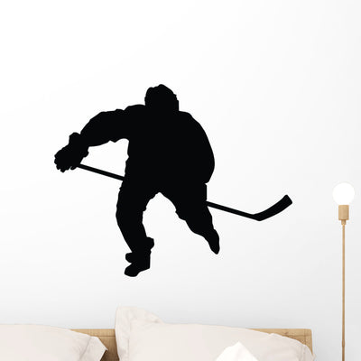 Hockey Silhouette Wall Decal shown on a wall