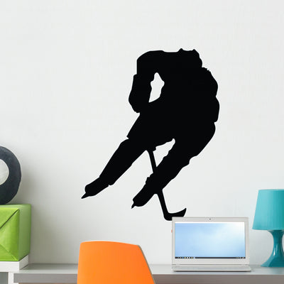 Hockey Silhouette Wall Decal shown on a wall