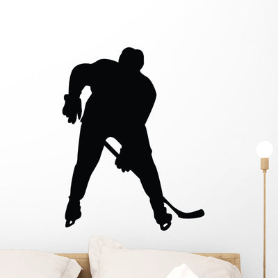 Hockey Silhouette Wall Decal shown on a wall