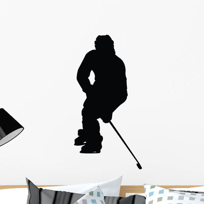 Hockey Silhouette Wall Decal shown on a wall