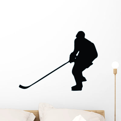 Ice Hockey Silhouette Wall Decal shown on a wall