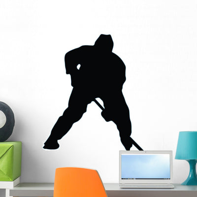 Ice Hockey Silhouette Wall Decal shown on a wall