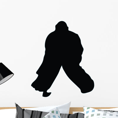 Ice Hockey Silhouette Wall Decal shown on a wall