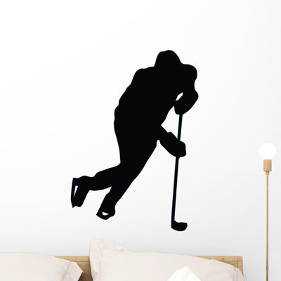 Ice Hockey Silhouette Wall Decal shown on a wall