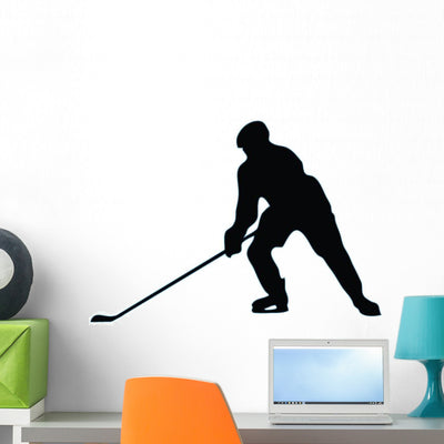 Ice Hockey Silhouette Wall Decal shown on a wall