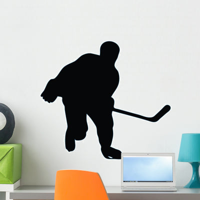 Ice Hockey Silhouette Wall Decal shown on a wall