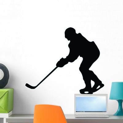 Ice Hockey Silhouette Wall Decal shown on a wall