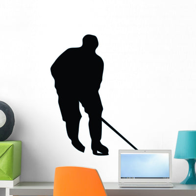 Ice Hockey Silhouette Wall Decal shown on a wall