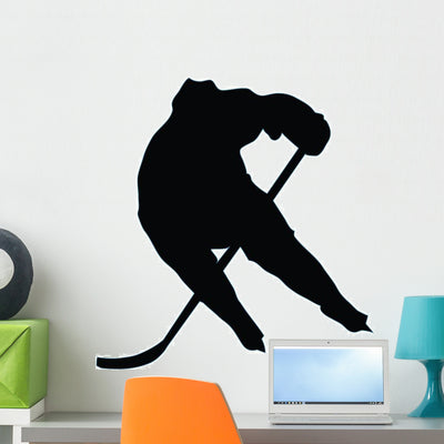 Ice Hockey Silhouette Wall Decal shown on a wall