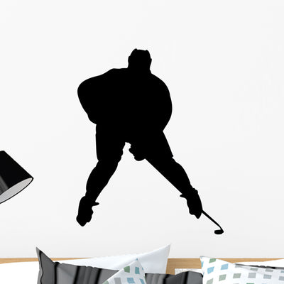 Defender Hockey Silhouette Wall Decal shown on a wall