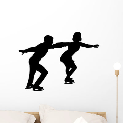 Ice Skating Couple Silhouette Wall Decal shown on a wall