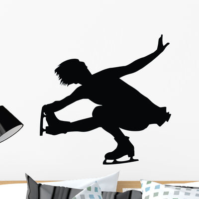 Ice Skating Silhouette Wall Decal shown on a wall